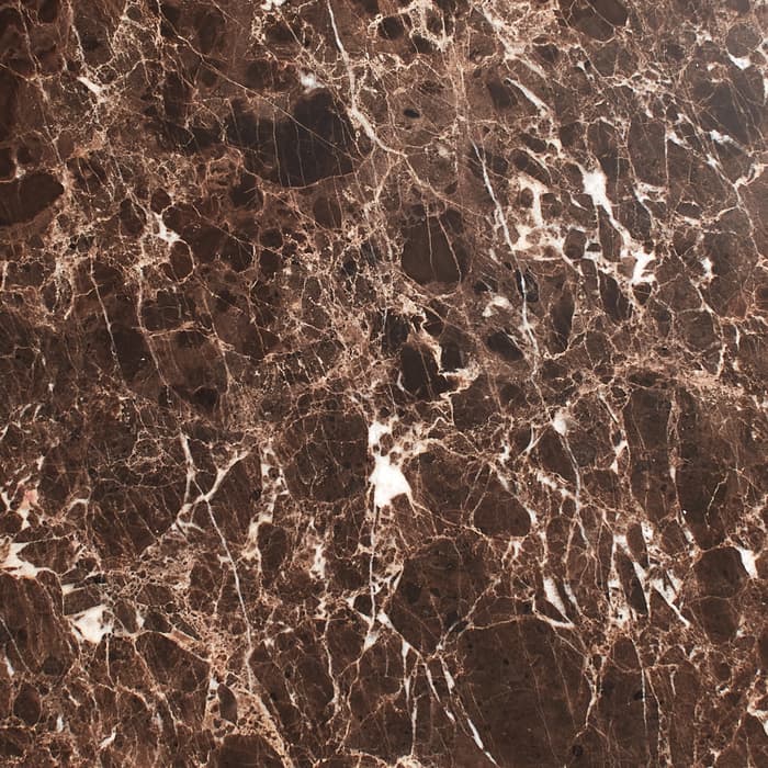 Rectangular brown marble slab with white veining, resting on a plain white background.