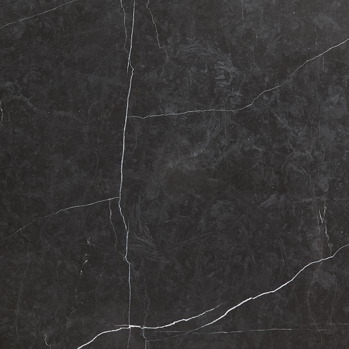A square black marble slab with prominent white veining, bordered by a thin dark frame, set against a plain white background.